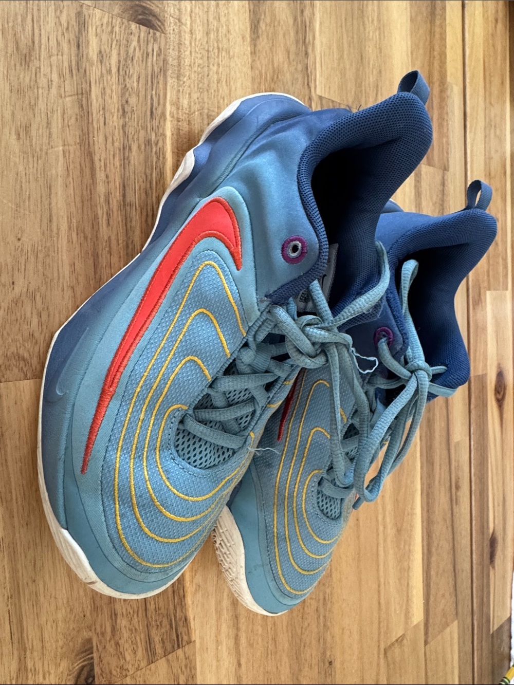 Nike Size 4.5Y Kids' Blue Teal Sneakers with Red and Yellow Accents